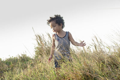 Man standing on grassy field