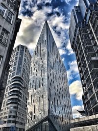 Low angle view of skyscrapers against sky