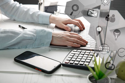 Man using laptop on table