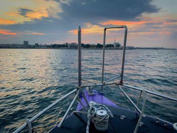 Sunset over the sea seen from a sailboat