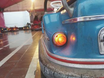 Close-up of vintage car on street