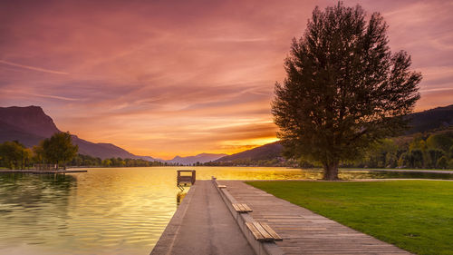 Scenic view of lake against sky during sunset