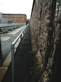 Road in city against clear sky