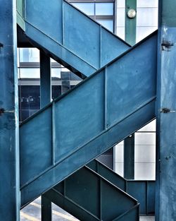 Metallic staircases against building