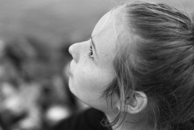 Close-up portrait of a girl looking away