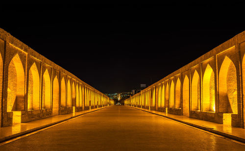 View of illuminated bridge at night