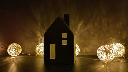 Light painting on table against wall at night