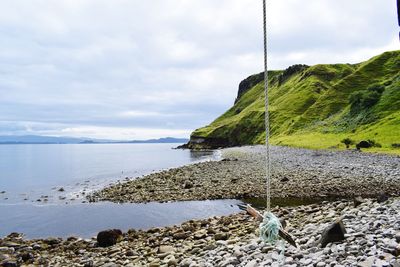 Panoramic view of the sea against the sky and cliff at the isle of skye in scotland