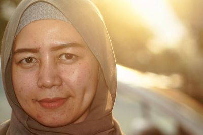 Close-up portrait of mid adult woman wearing hijab