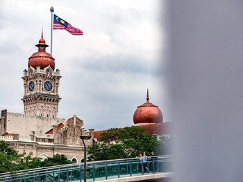 Low angle view of sultan abdul samad building against cloudy sky