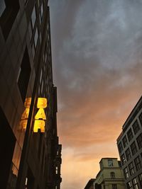 Low angle view of modern buildings against sky