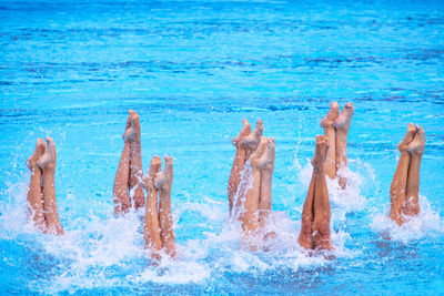 Synchronized or artistic swimming in swimming pool