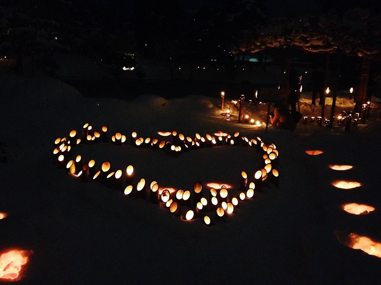 illuminated, night, celebration, lighting equipment, decoration, burning, large group of objects, in a row, glowing, high angle view, tradition, dark, abundance, outdoors, light - natural phenomenon, cultures, no people, flame, fire - natural phenomenon, traditional festival