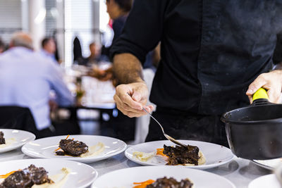 People having food in restaurant