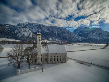 Snow covered mountain against sky