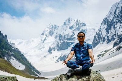 Man sitting on mountain