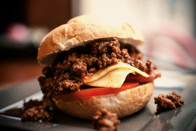 Close-up of burger in plate on table