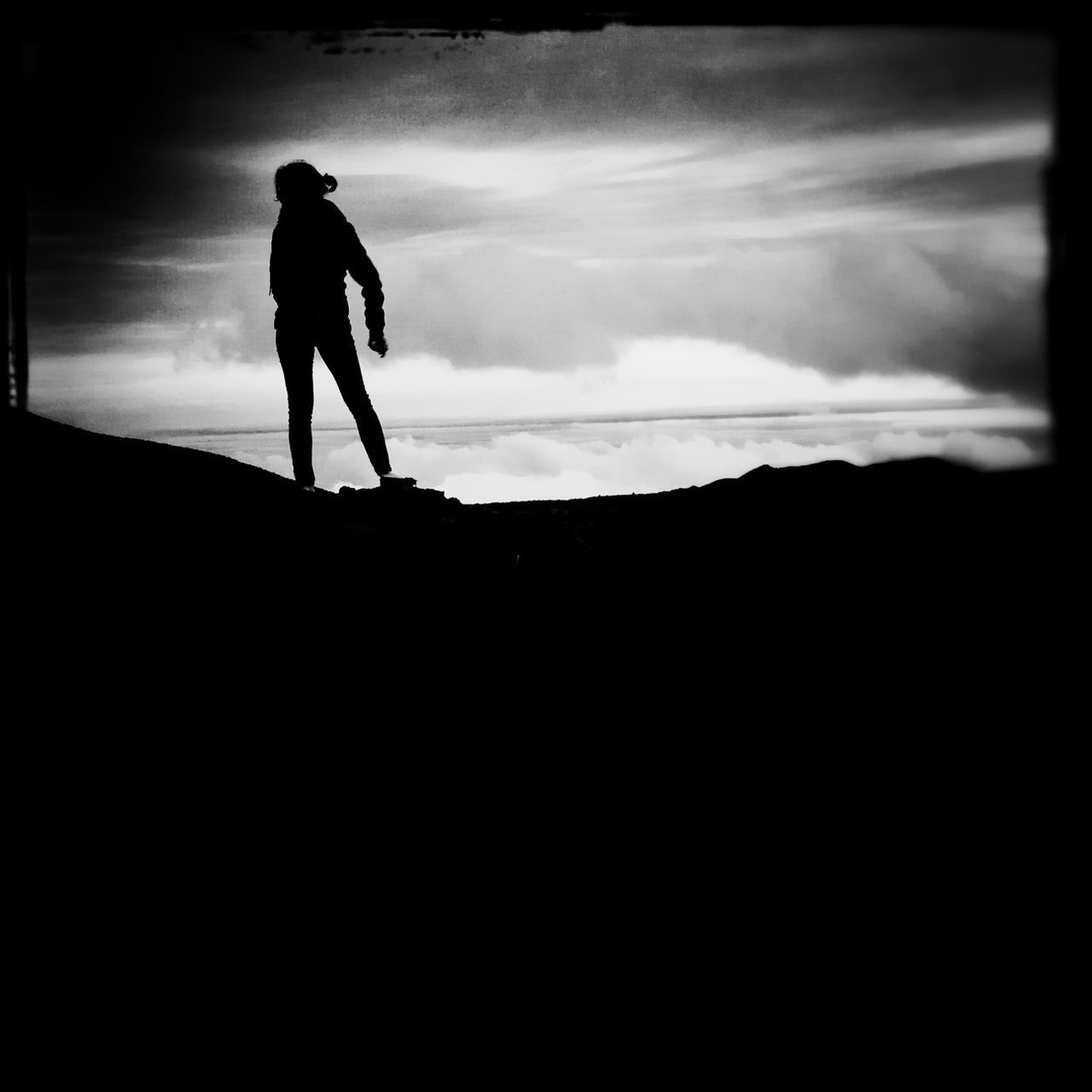 silhouette, full length, sky, men, standing, lifestyles, transfer print, leisure activity, rear view, walking, auto post production filter, outline, unrecognizable person, one man only, side view, nature, cloud - sky