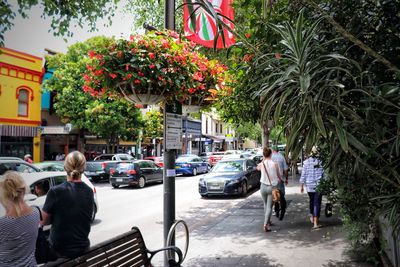 People walking on street in city