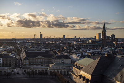 High angle view of city against sky during sunset