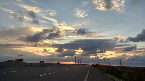 Road against sky during sunset