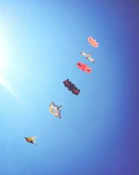 Low angle view of airplane flying in sky