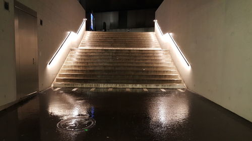 Illuminated walkway in water