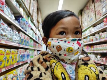 Portrait of cute girl in store