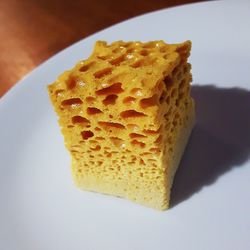 Close-up of cake against white background