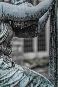 Close-up of statue against blurred background