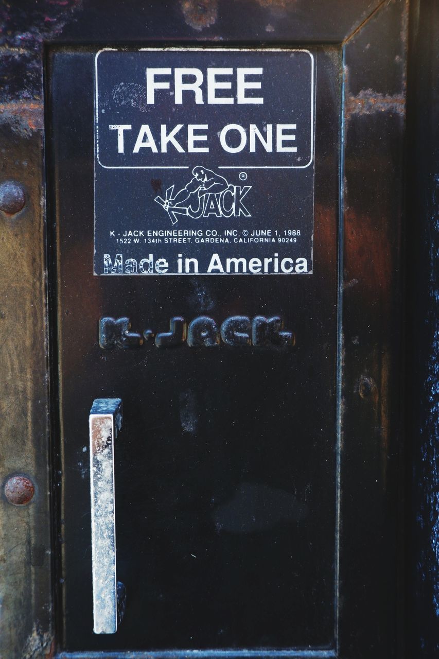 CLOSE-UP OF INFORMATION SIGN