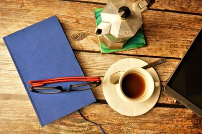 High angle view of coffee cup on table