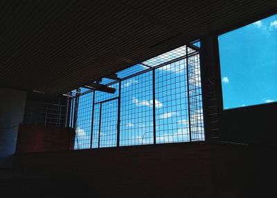 Low angle view of glass window in building