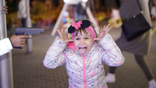 Portrait of girl holding bouquet