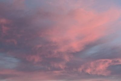 Low angle view of dramatic sky during sunset