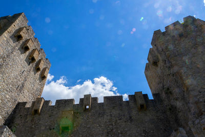 Low angle view of old building against sky