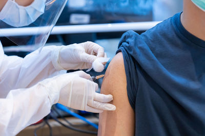 Midsection of person holding hands