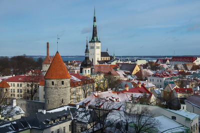 High angle view of st olaf church with cityscape against sky