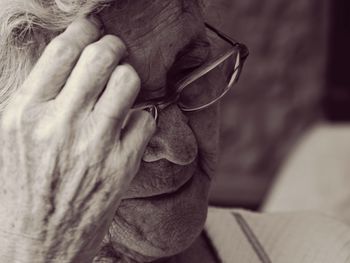 Close-up of senior woman wearing eyeglasses