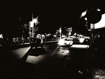 Illuminated street at night