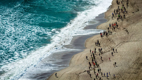 Panoramic view of people on beach