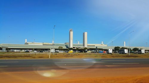 View of road against clear blue sky