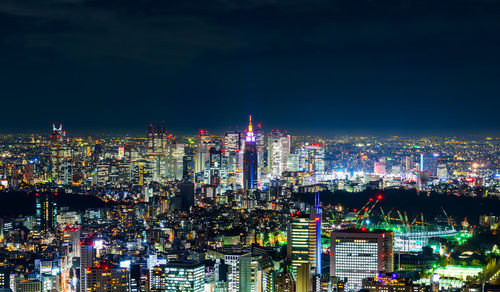 High angle view of illuminated cityscape at night