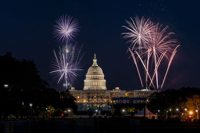 Firework display at night