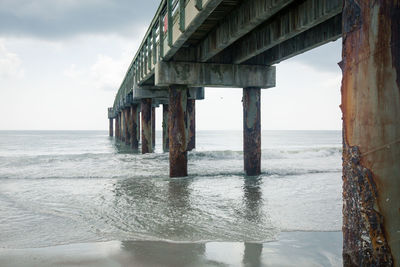 St johns county ocean pier over sea against sky