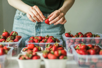 Midsection of man preparing food