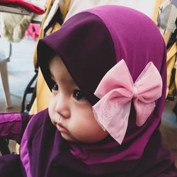 Close-up of cute girl wearing hijab