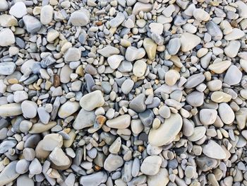 Full frame shot of pebbles on beach