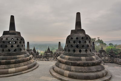 Stupas in borobudur buddhist temple. yogyakarta. central java. indonesia