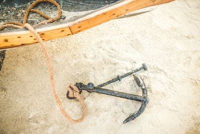 High angle view of ropes on sand